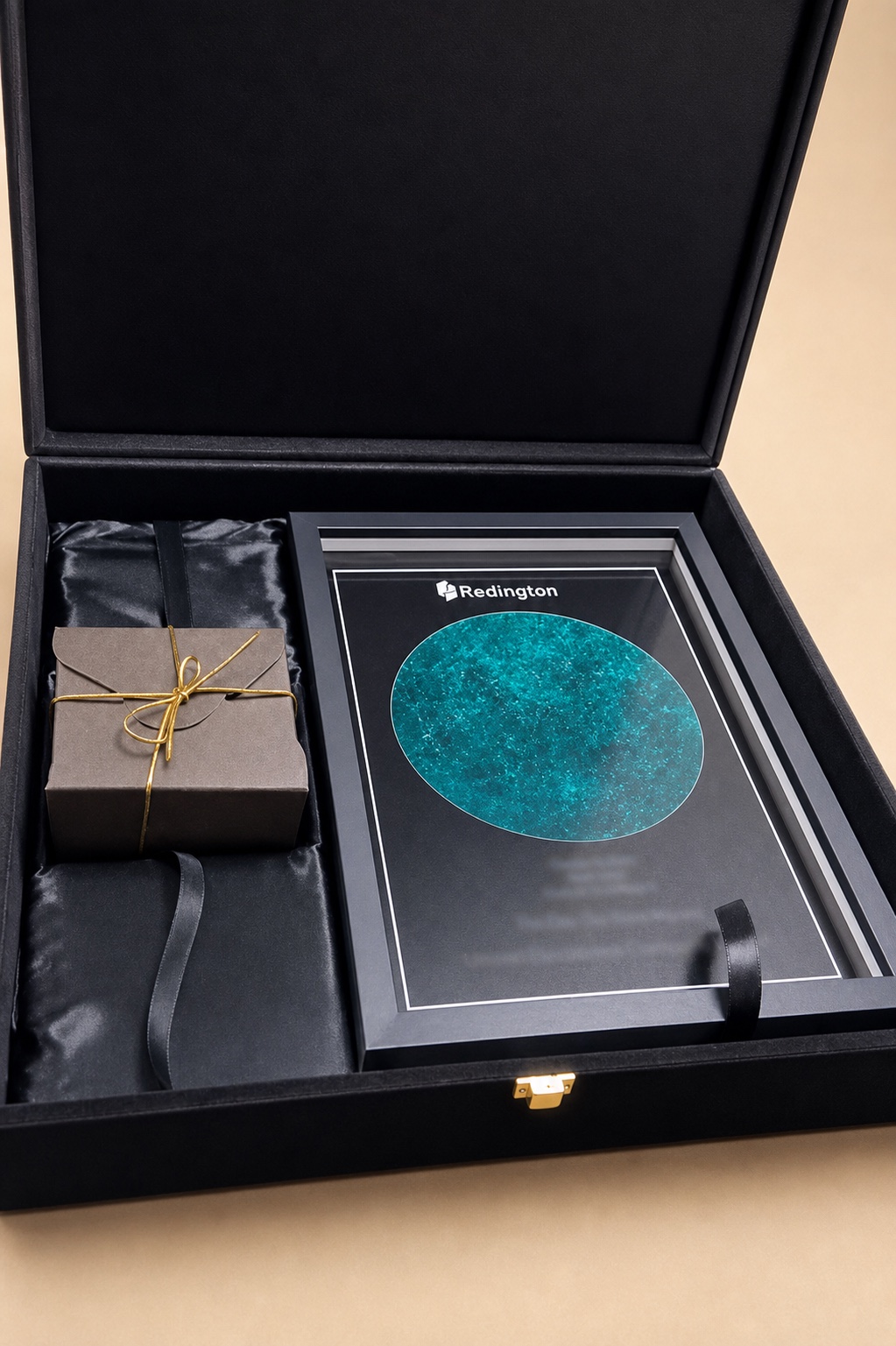 Premium presentation box with a framed Redington award and gifts