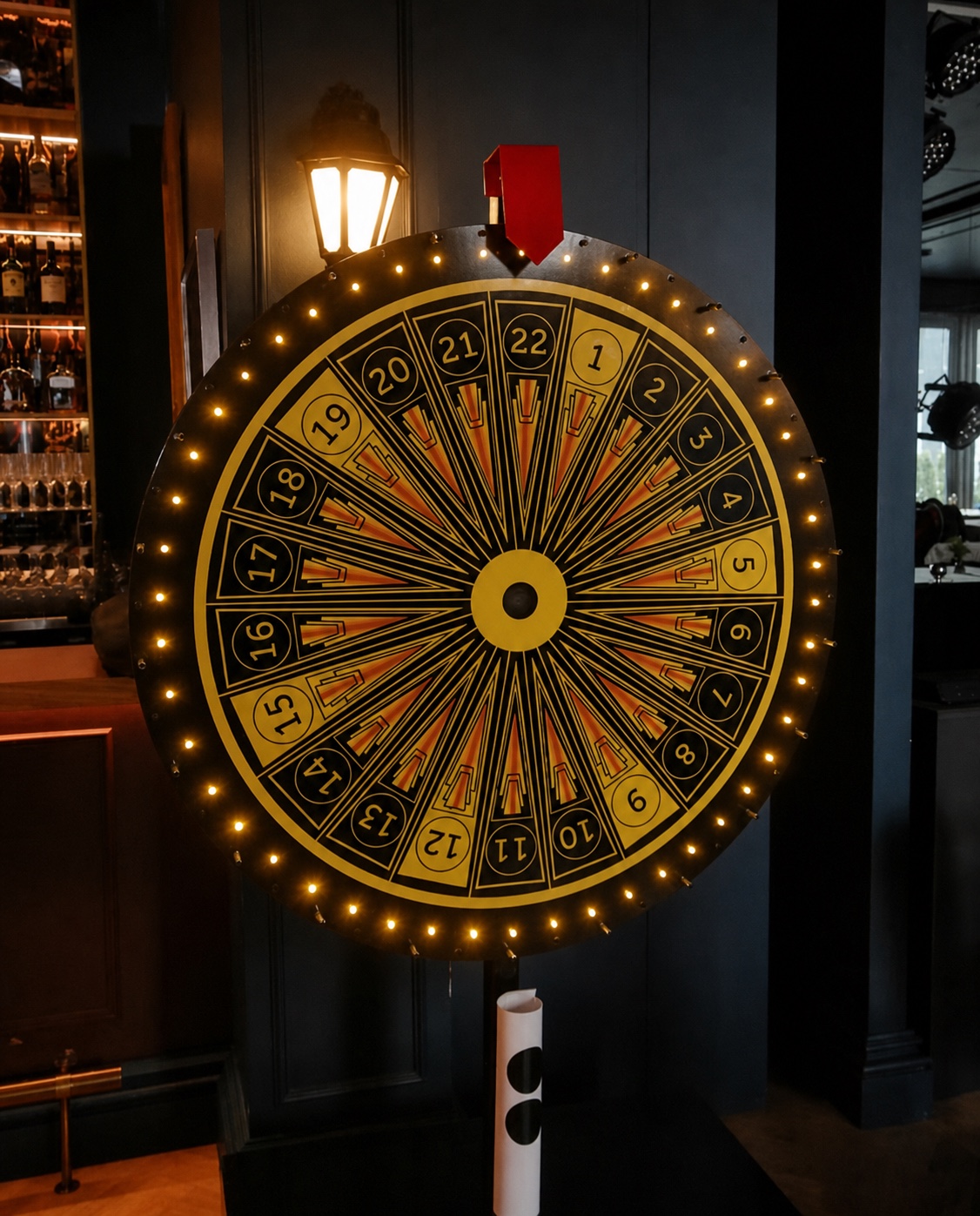 Custom black and gold illuminated prize wheel for an event activation